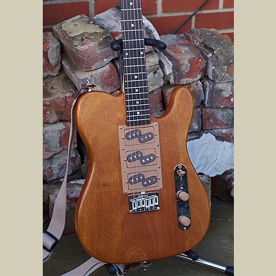 split coil strat pickups in a natural wood telecaster